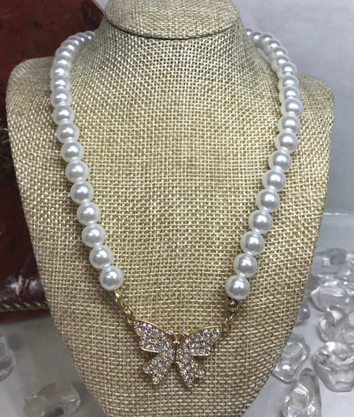 pearl necklace w/diamond studded butterfly