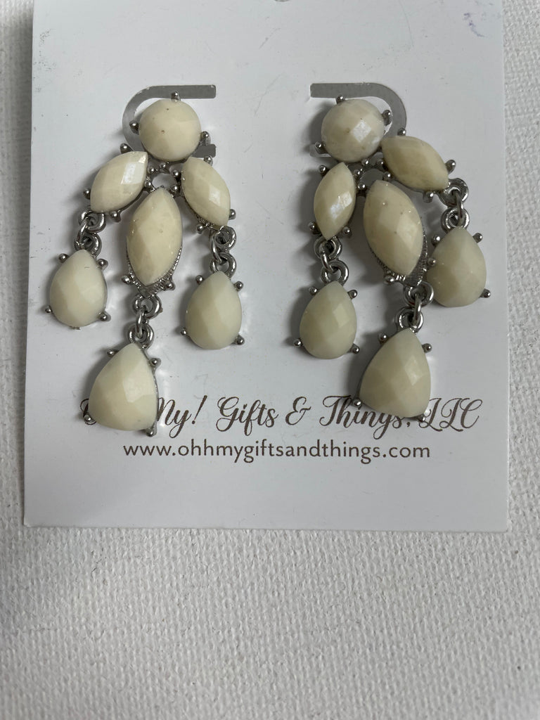 Cream chandelier earrings featuring faceted teardrop and marquise stones on silver-tone chains displayed on a white branded card from OhhMy! Gifts and Things, LLC.