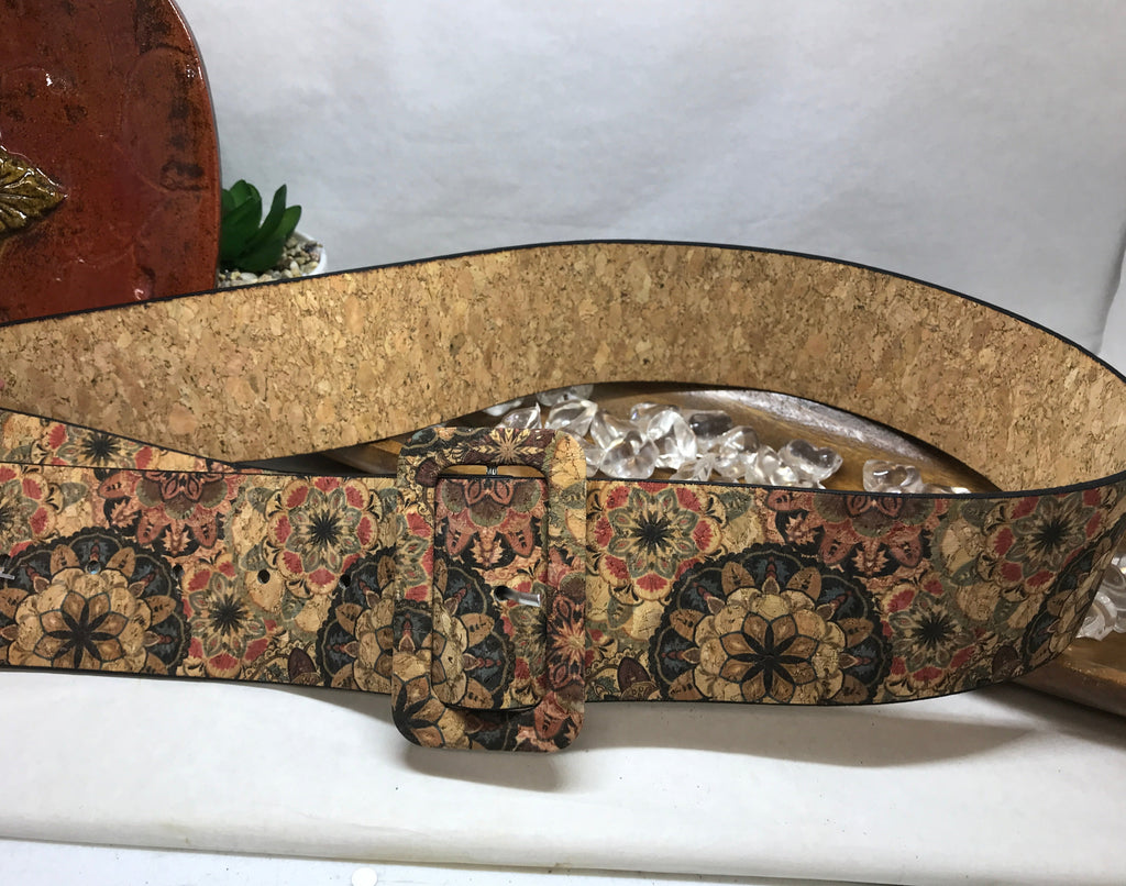 neutral colored thick flowered belt