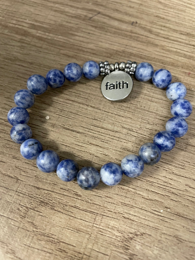 Blue/White bracelet w/silver round pendent w/faith
