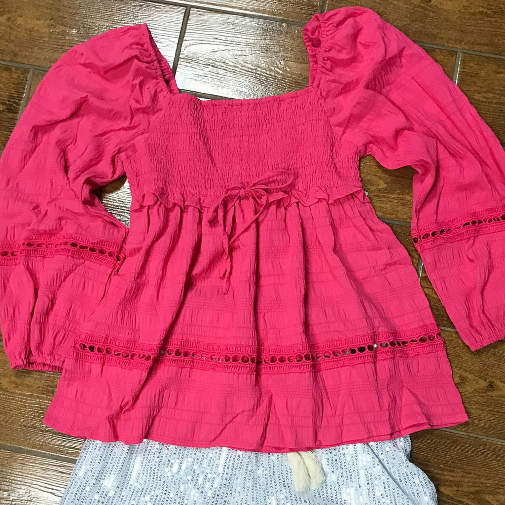 hot pink boho top with ruffle designs and lace cutouts