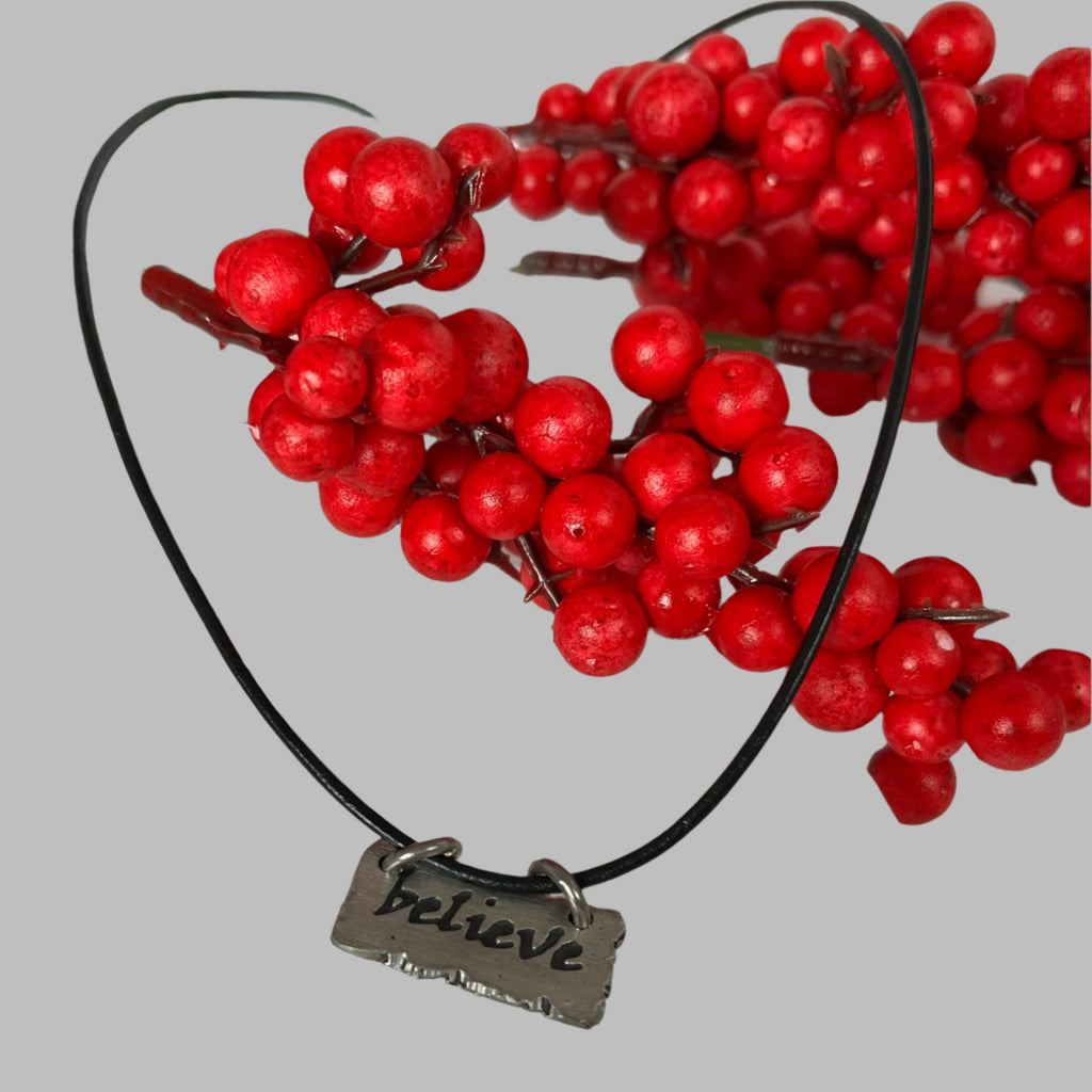 Believe stamped necklace of black leather cord OhhMy! Gifts and Things, LLC