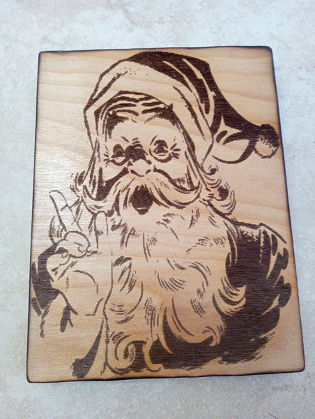 Handmade 8 1/2" x 6 1/2" burnt wood w/lasered Santa's Face