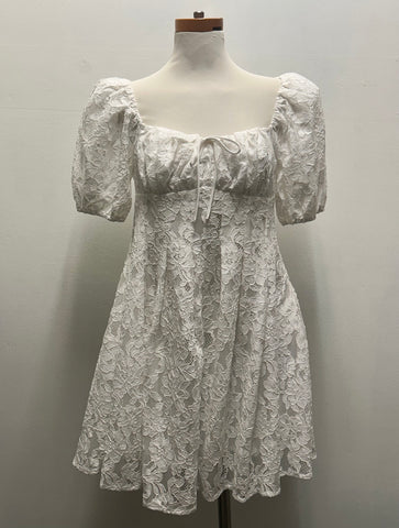 White Lace Mini Dress with Oval Neckline & Bow Button Back Landon Ramsey-Maria Briones