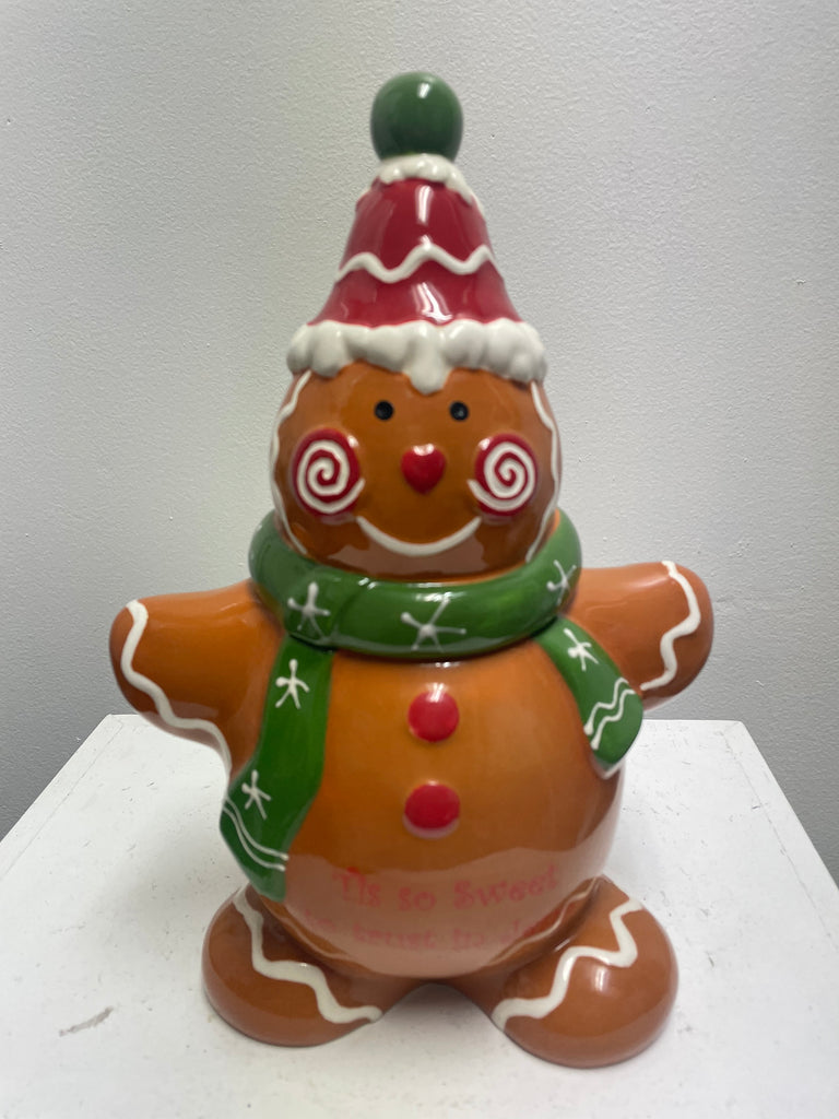 Festive gingerbread man cookie jar with smiling face and decorative icing details, perfect for holiday kitchen storage and Christmas decor