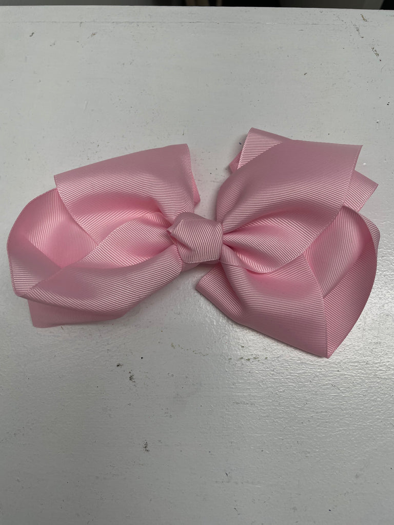 Large, oversized hair bows for girls and kids. Statement bow clips and accessories perfect for special occasions, pageants, photos, and everyday style.-Pink clip on