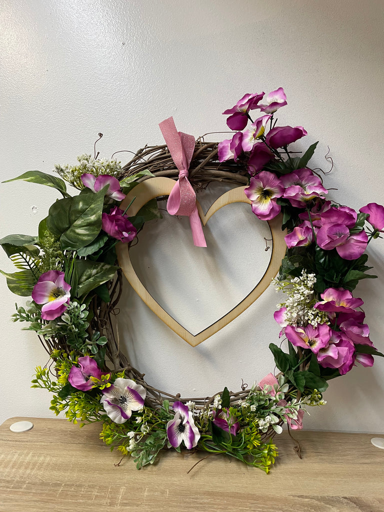 Beautiful 17x17 handmade Valentine wreath perfect for door decor. Features romantic heart accents & premium craftsmanship. Ready to hang Valentine's Day decoration.