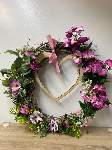 Beautiful 17x17 handmade Valentine wreath perfect for door decor. Features romantic heart accents & premium craftsmanship. Ready to hang Valentine's Day decoration.
