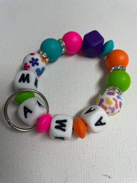 Mama Multi color Keychains-round MAMA on white block