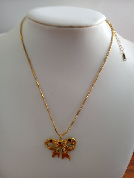 18" gold Thin Necklace w/rectangle Pendent w/imprint of rose Alisha Groo