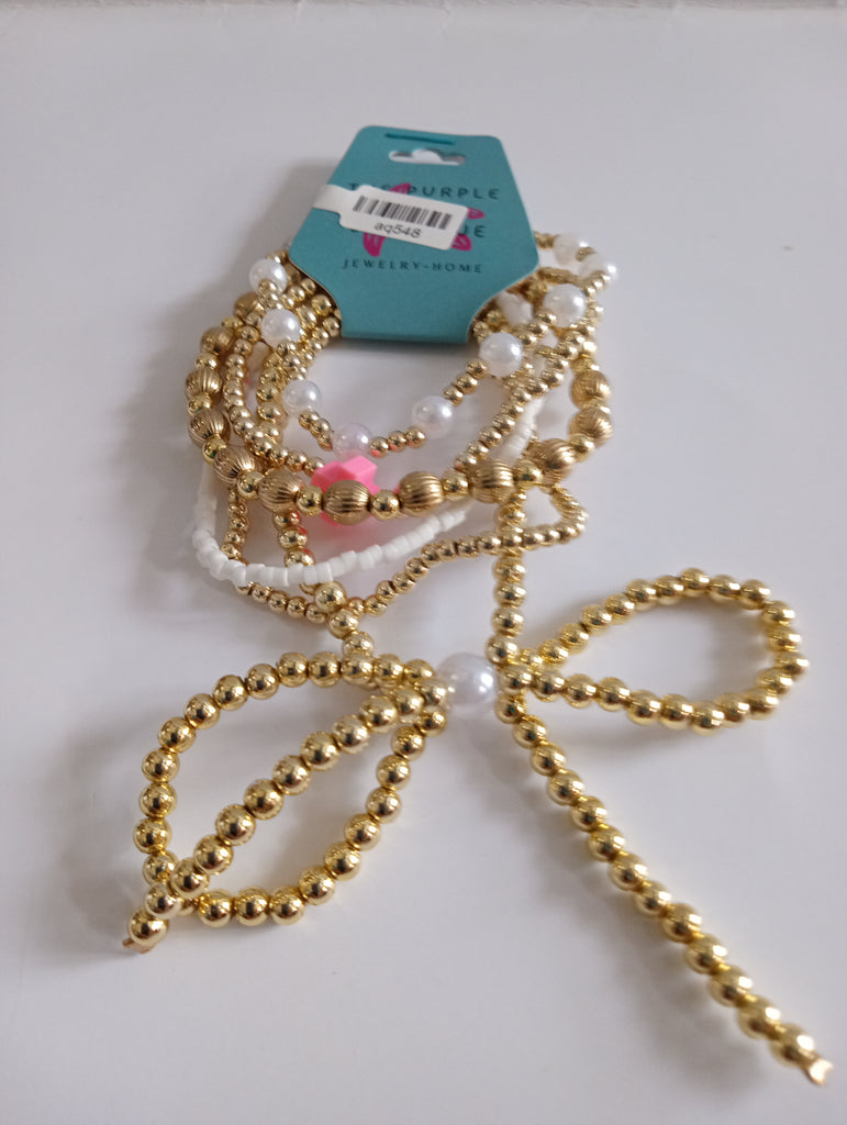 Bow Knot Bracelets-6 strand w/pink cross
