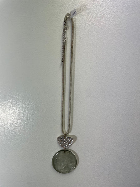 Silver necklace with a pendant on a white background