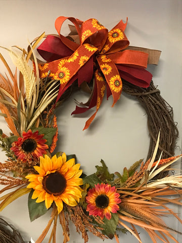 Fall Wreath w/Sunflowers-grape vine 19" round with Orange Bow /w sunflower design