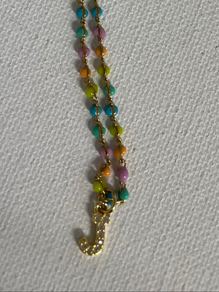 Gold 13"Multicolored beaded necklace w Letter J in cubic stones 
