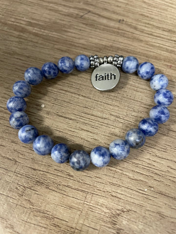 Blue/White bracelet w/silver round pendent w/faith