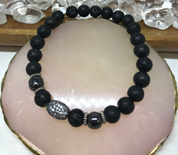 black stone bracelet with a silver bedazzled bead