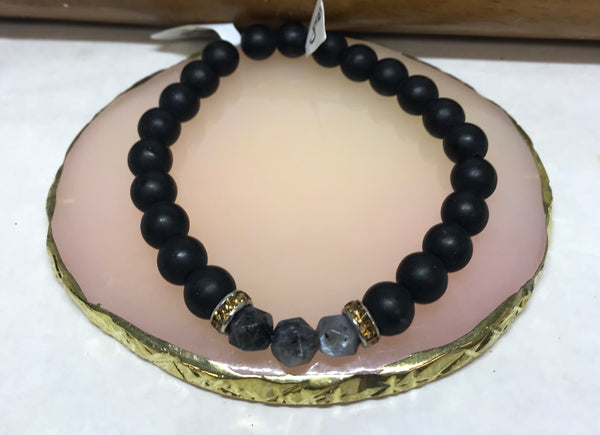 black beaded bracelet with 3 gems and gold stones