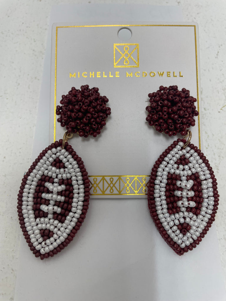 Maroon/white beaded dangle football earring Studs