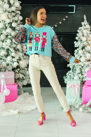 Nutcrackers on Blue Sweatshirt with Sequin Sleeves Grace+Emma