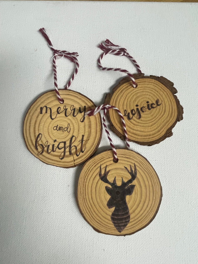Set of three assorted wooden Christmas ornaments with rustic farmhouse designs, perfect for holiday tree decorating and seasonal home decor"