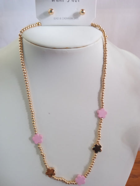 A gold beaded necklace with pink and dark gold clover charms , with matching stud earrings. 