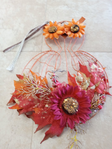 Orange wire owl wall decor
