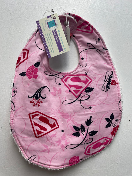 "Handmade baby bibs by Jody Martin-large pink superwomen design
