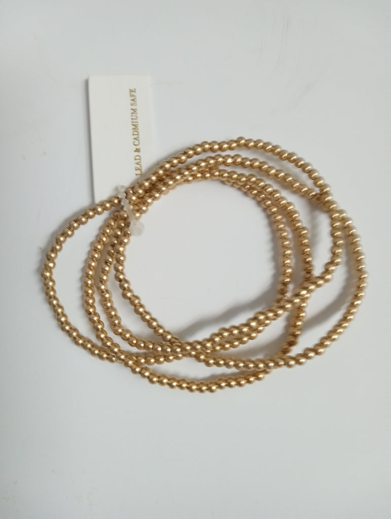 4-Strand Gold Beaded Stretch Bracelet – Stackable & Chic