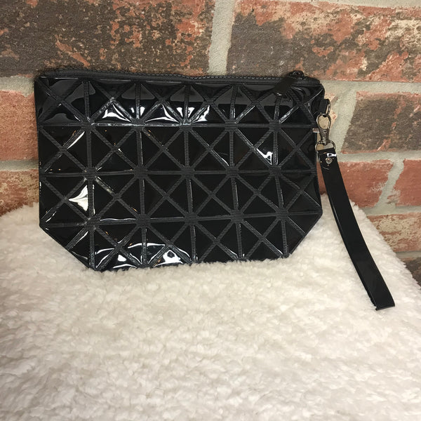 Clutch bag wristlet. Black with design throughout