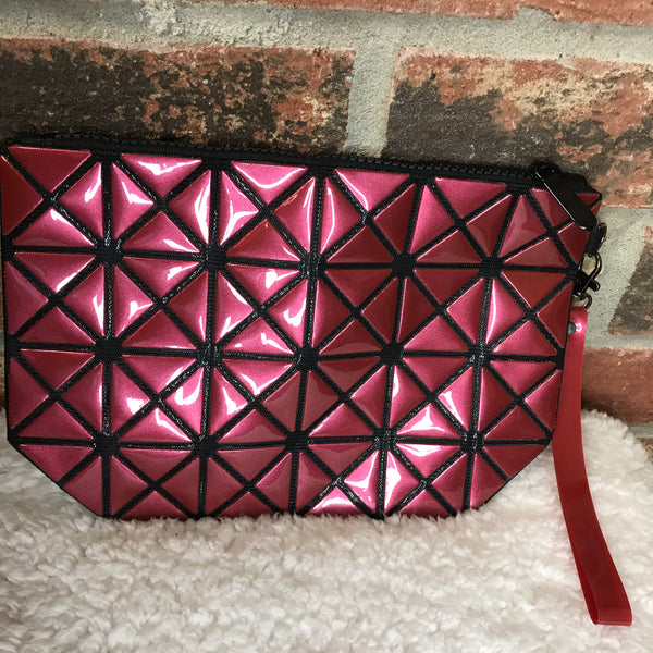 Clutch bag wristlet. Red with black design throughout
