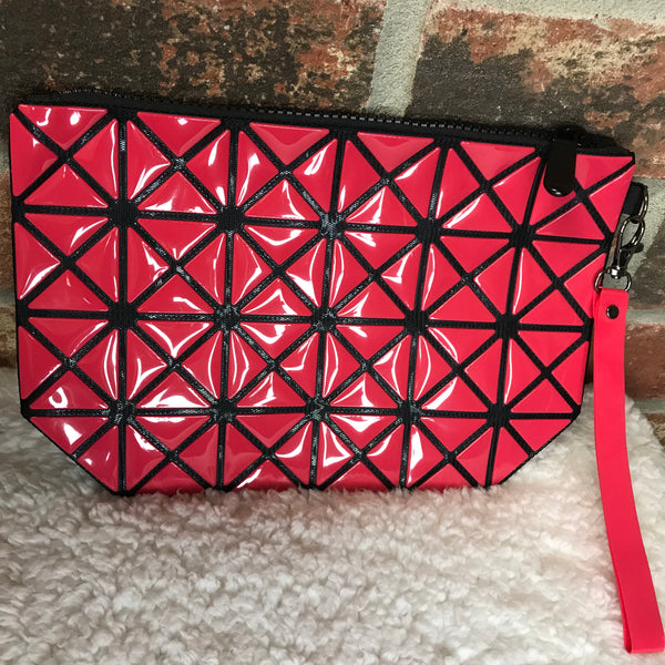 Clutch bag wristlet. Red with black design throughout. 