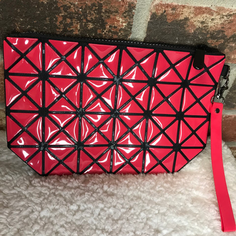 Clutch bag wristlet. Red with black design throughout. 