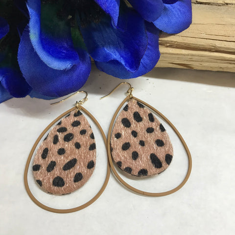 Gold Hook Earrings with a large tan teardrop hoop and tan filled teardrop with black polka-dots