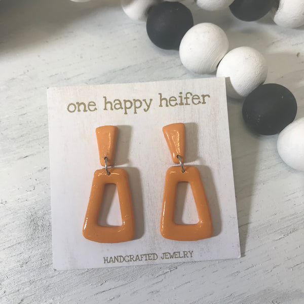 handmade orange tripod earrings