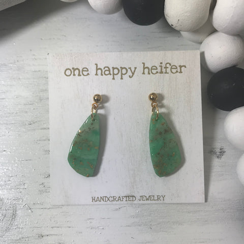 gold and green earrings in an oval shape