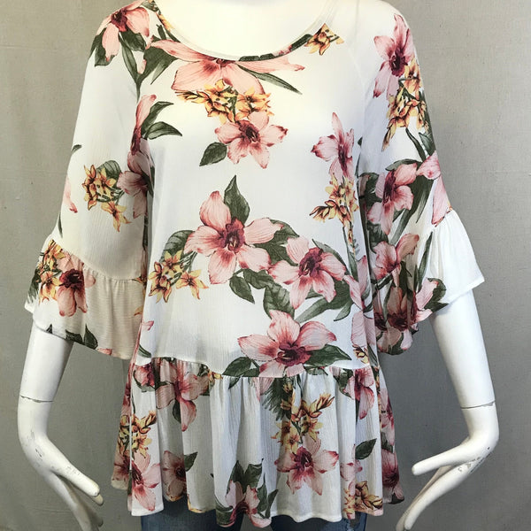 white and floral babydoll style top