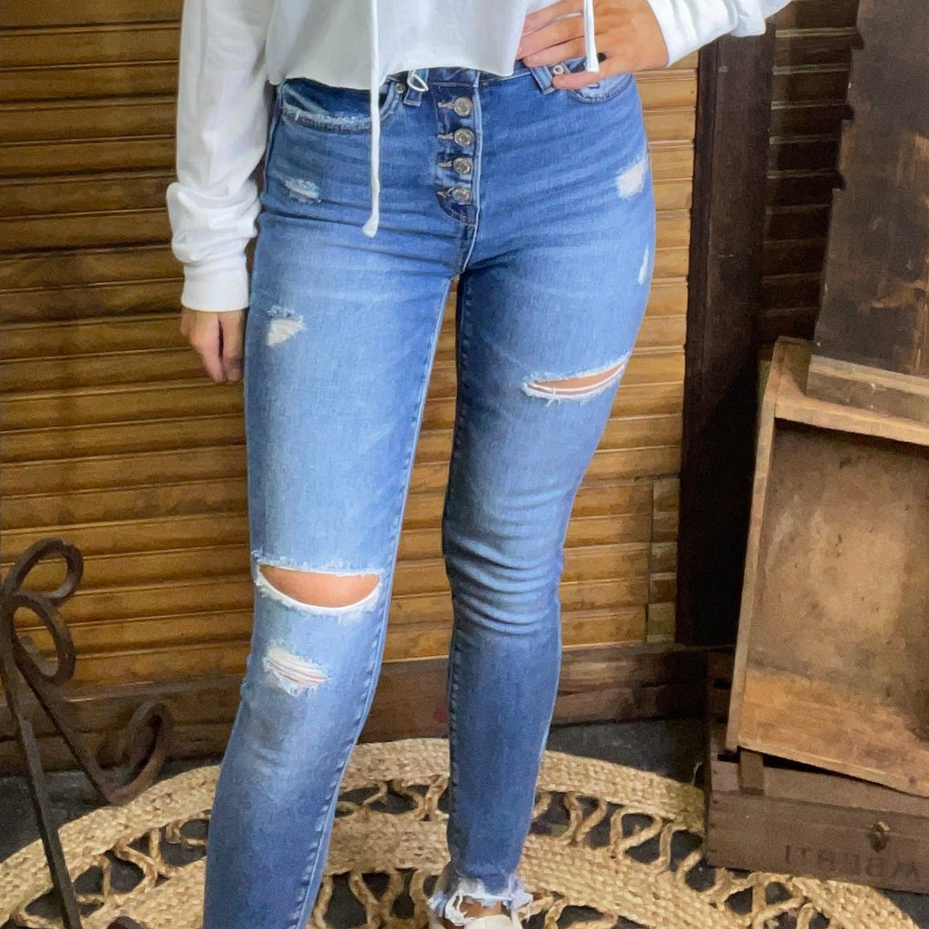 distressed skinny jeans w/frayed bottom