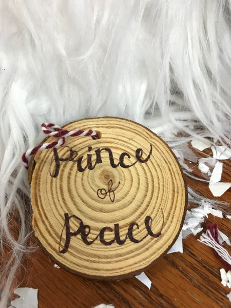 wood ornament with Prince of Peace burned into it