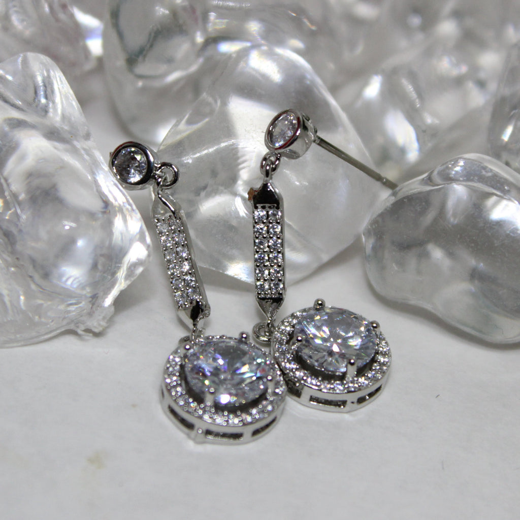 Super shiny diamond earrings.
