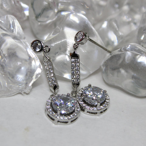 Super shiny diamond earrings.