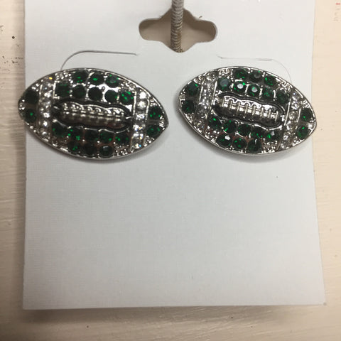 Pierced silver stud earrings: Silver football with green and silver stone.